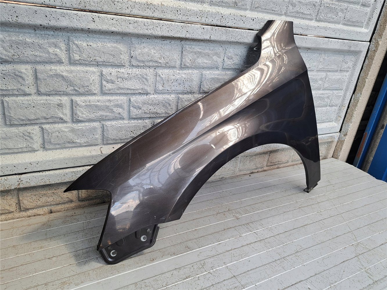 BŁOTNIK PRZEDNI LEWY VW PASSAT B7 2010 - 2017 ORYGINAŁ (17783575594)