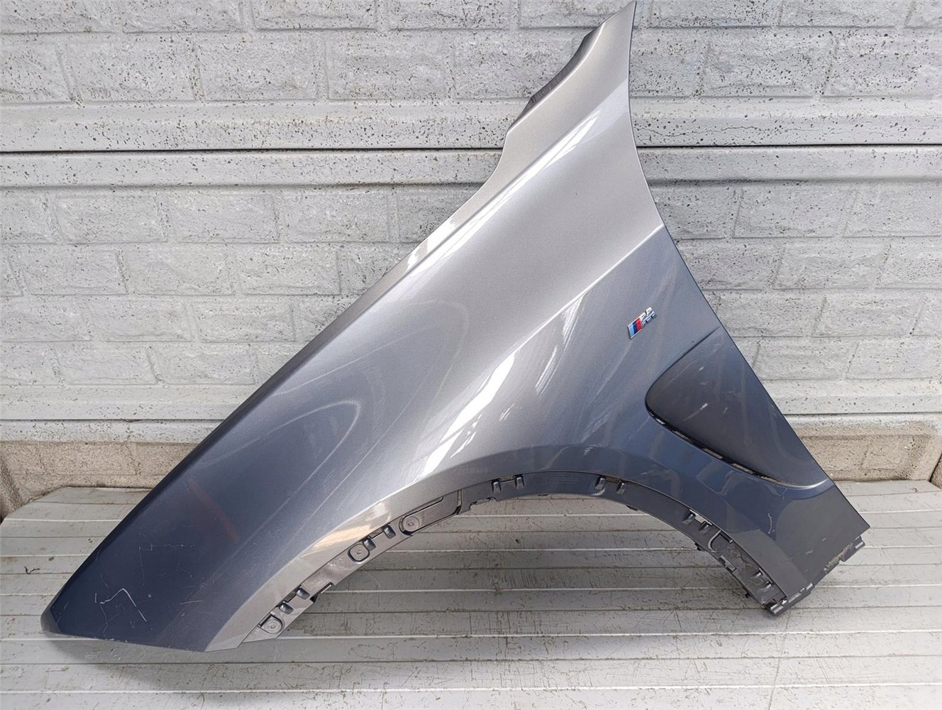 BMW X5 F15 BŁOTNIK LEWY ORYGINAŁ (17787828486)