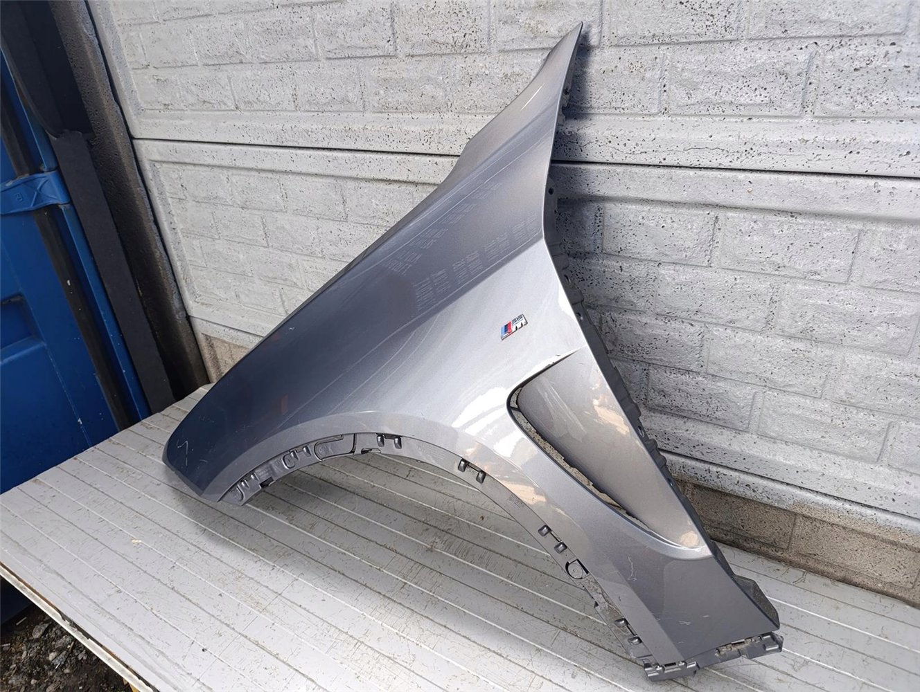 BMW X5 F15 BŁOTNIK LEWY ORYGINAŁ (17787828486)