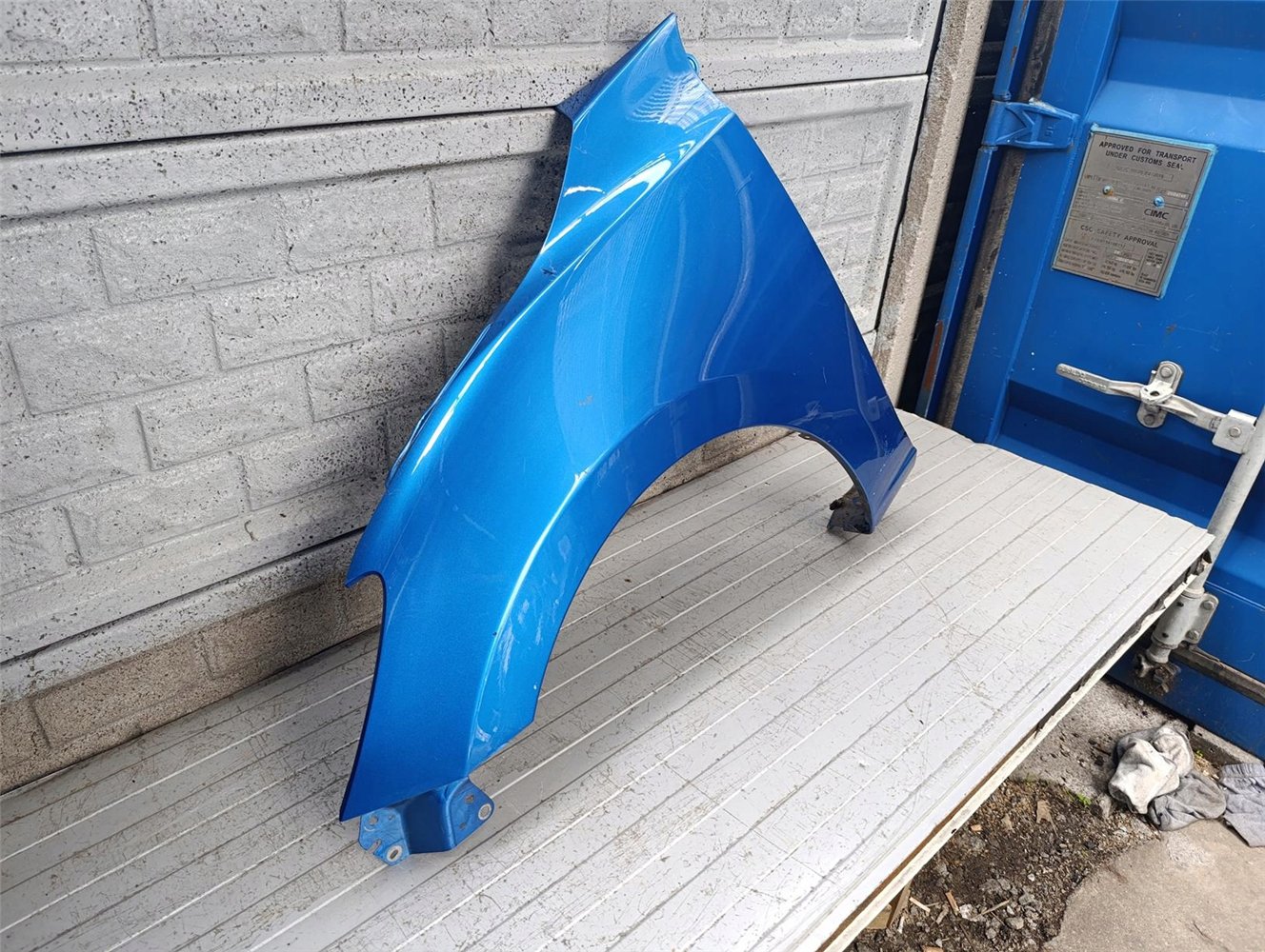 MAZDA 2 II 2015-2022 BŁOTNIK LEWY PRZEDNI ORYGINAŁ (17788185353)