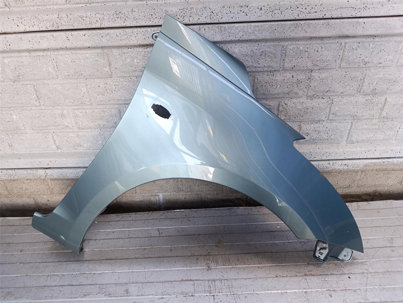 SUZUKI SWIFT Mk7 10-17 BŁOTNIK PRZEDNI PRAWY ORYGINAŁ (17790510972)