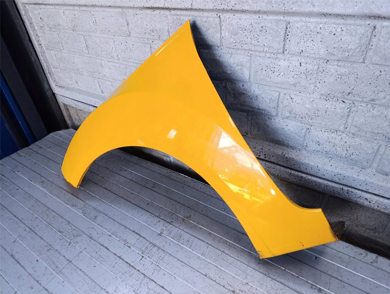 HYUNDAI VELOSTER 11- BŁOTNIK PRZEDNI LEWY ORYGINAŁ (17790563805)