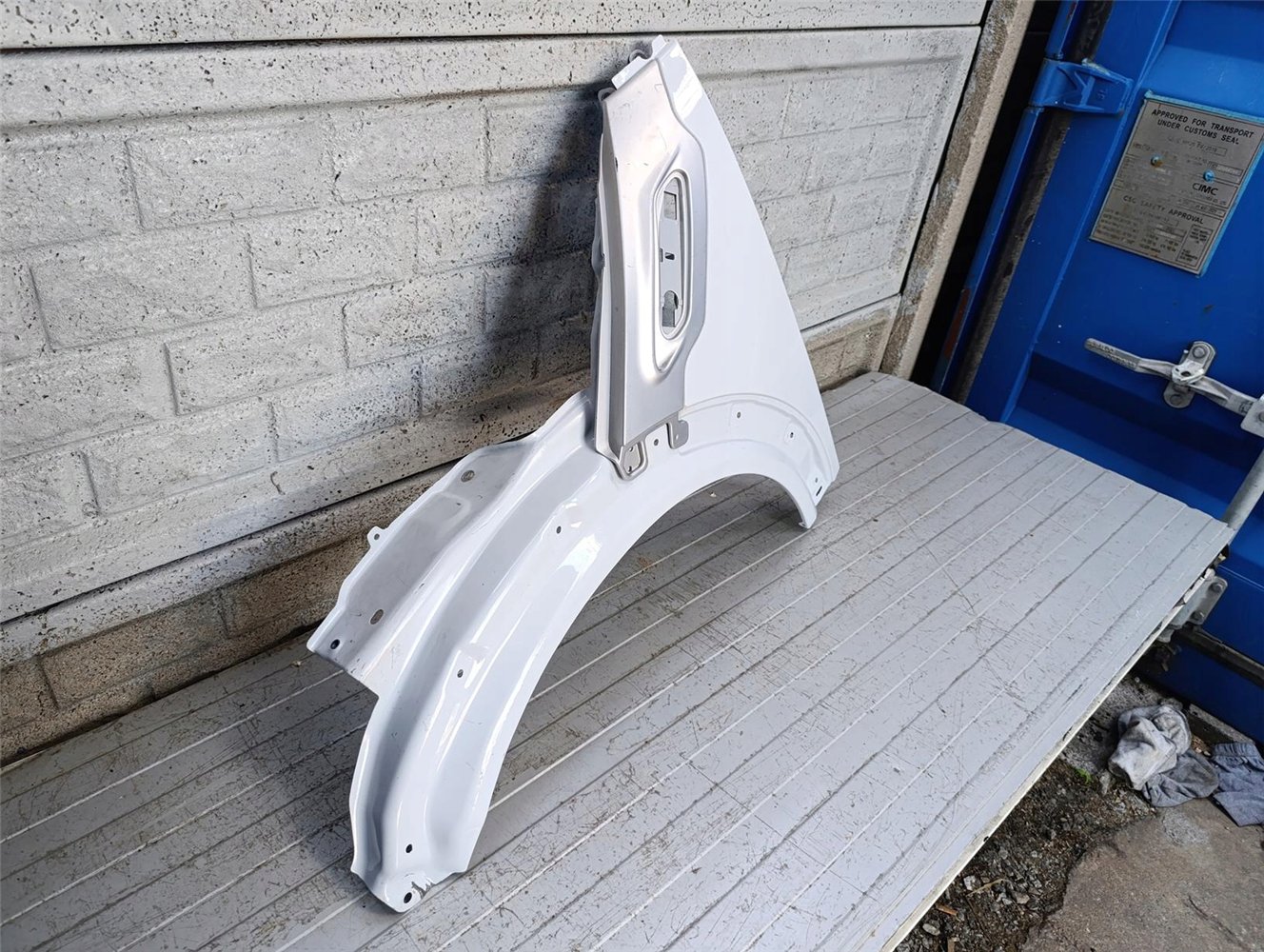 MINI COOPER COUNTRYMAN PACMAN R60 61 BŁOTNIK LEWY ORYGINAŁ (17793775817)