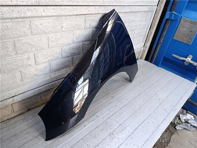 MINI COOPER HATCH IV E 2023- BŁOTNIK LEWY PRZEDNI ORYGINAŁ (17793849595)