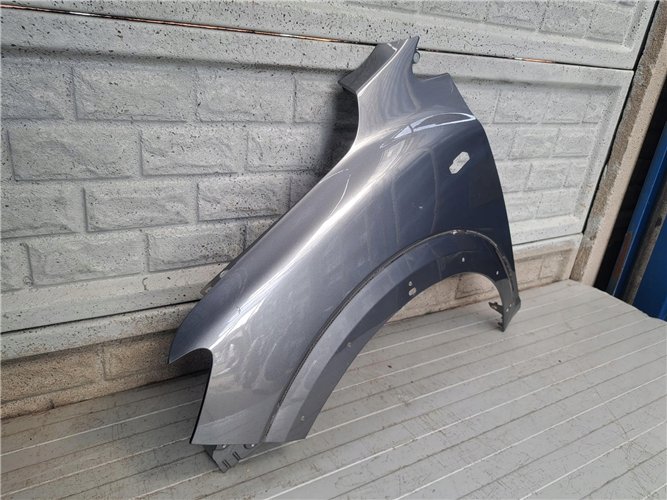 DACIA SANDERO STEPWAY III 3 BŁOTNIK PRZEDNI LEWY ORYGINAŁ (17810796638)