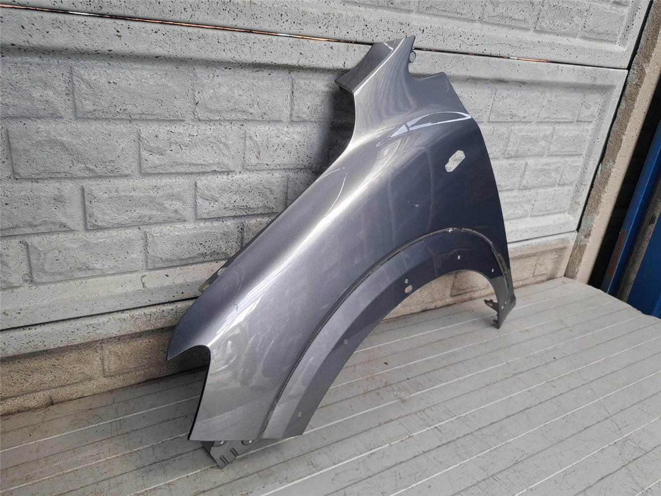 DACIA SANDERO STEPWAY III 3 BŁOTNIK PRZEDNI LEWY ORYGINAŁ (17810796638)