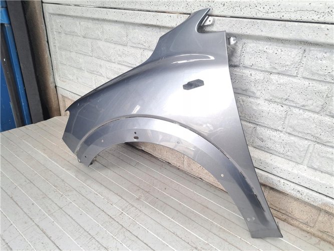 DACIA SANDERO STEPWAY III 3 BŁOTNIK PRZEDNI LEWY ORYGINAŁ (17810796638)