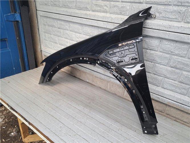 AUDI E-TRON ETRON 2019-2023 BŁOTNIK LEWY PRZEDNI ORYGINAŁ (17810821340)
