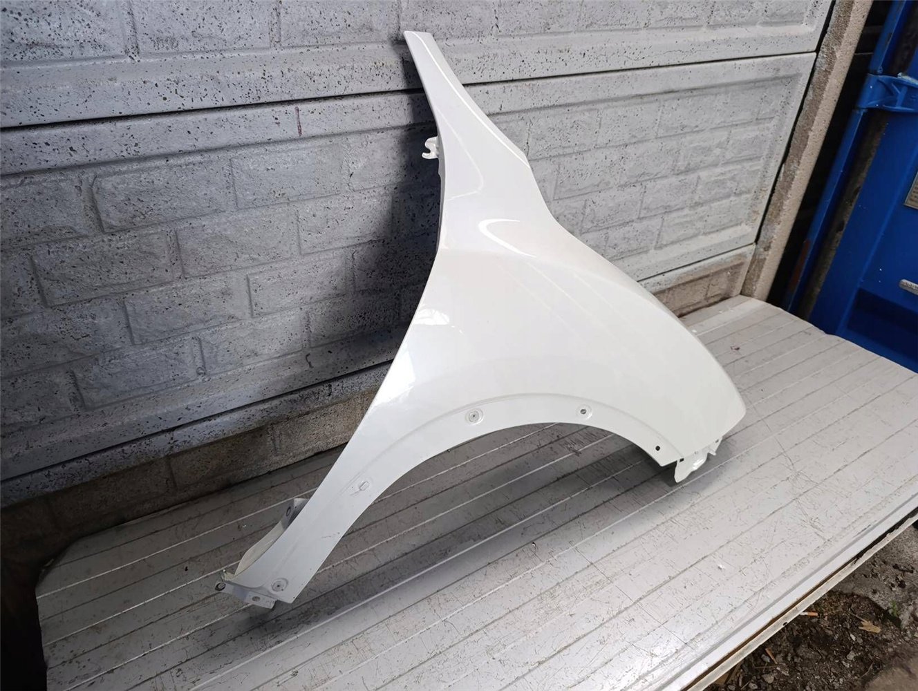 NISSAN JUKE 14-19 LIFT BŁOTNIK PRAWY PRZEDNI ORYGINAŁ (17811801756)