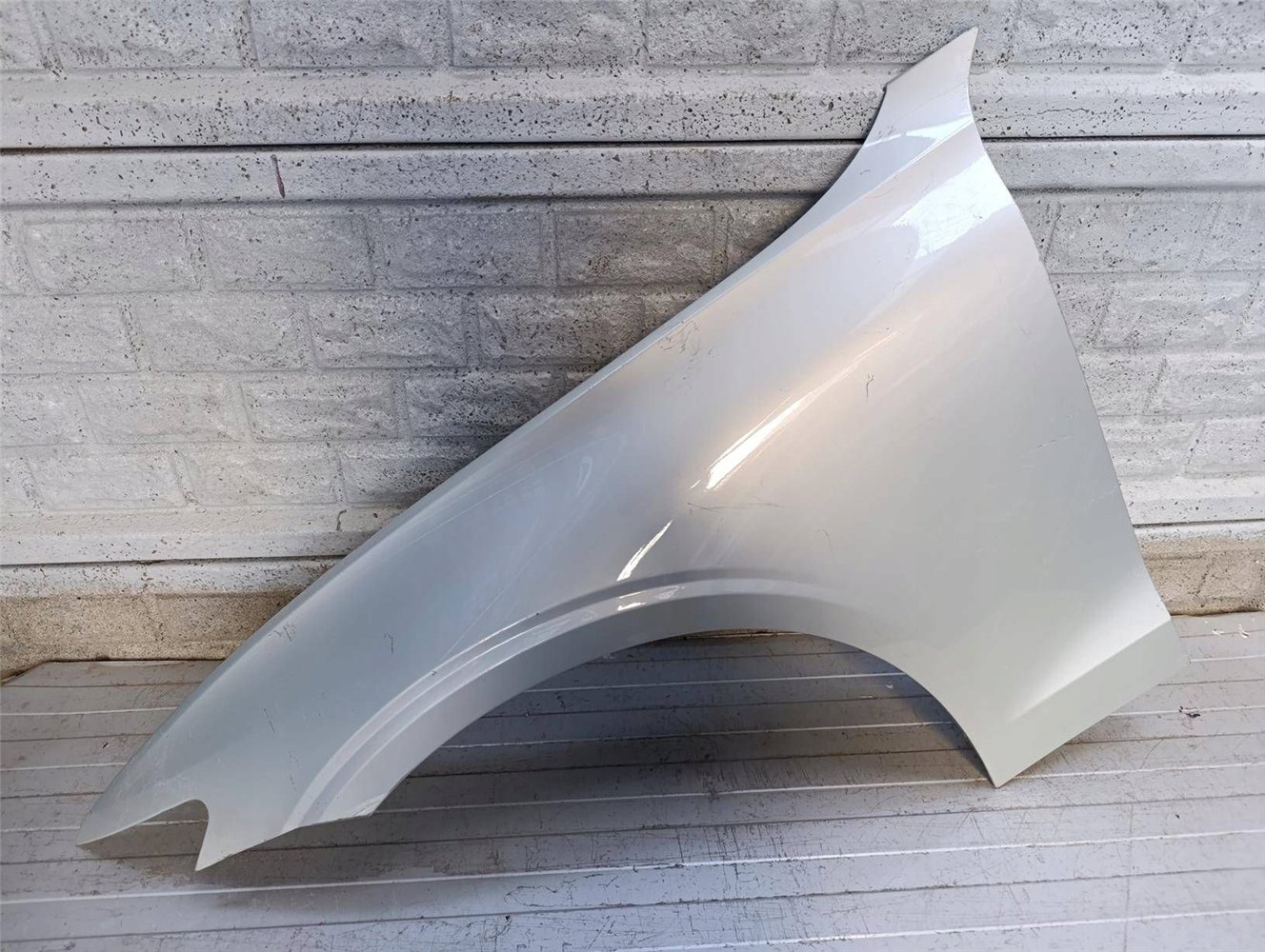 VOLVO V60 S60 2018-2024 BŁOTNIK LEWY PRZEDNI ORYGINAŁ (17813948645)