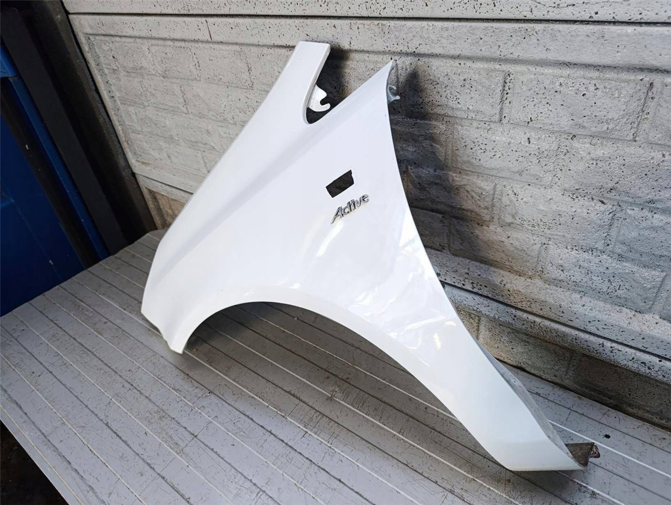 BŁOTNIK LEWY OPEL CORSA D 2006-2015 ORYGINAŁ (17813953195)