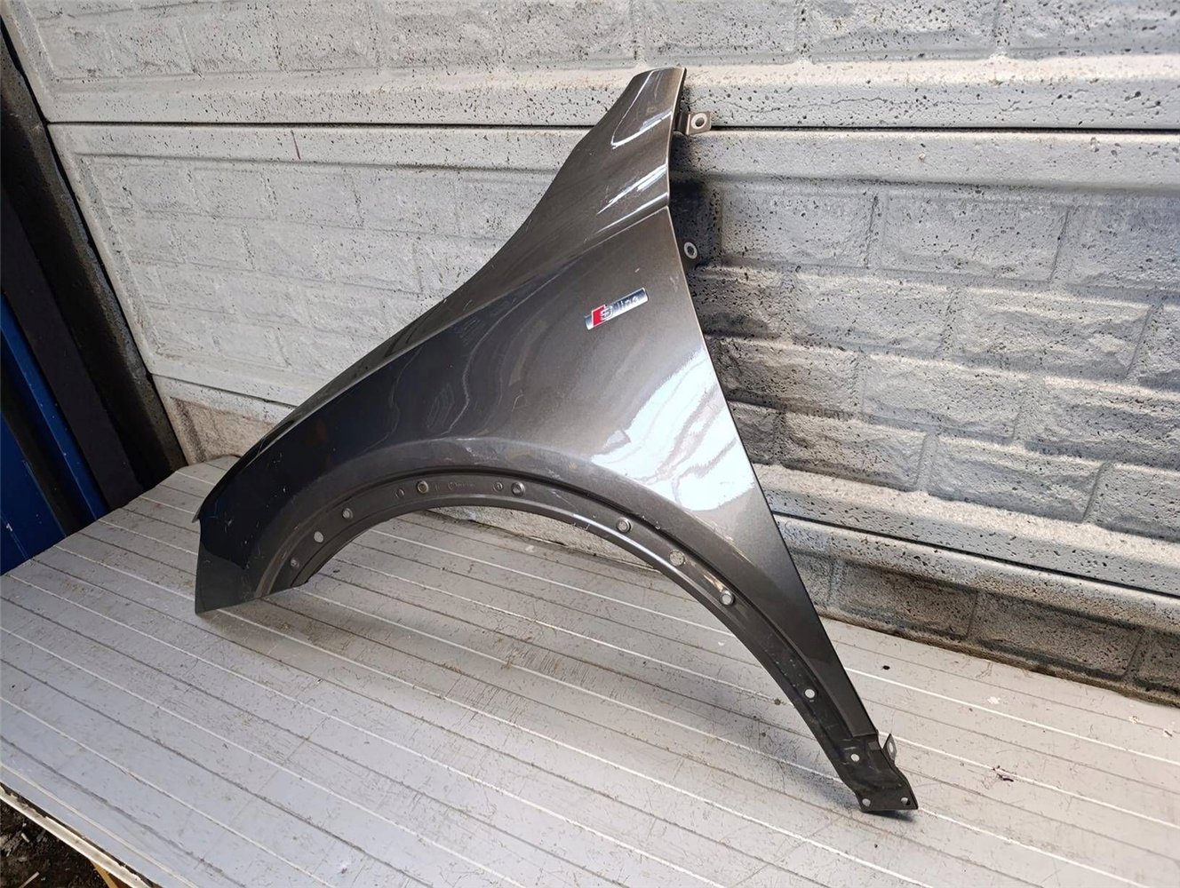 AUDI Q3 8U0 2011-2018 BŁOTNIK PRZEDNI LEWY ORYGINAŁ (17814011130)