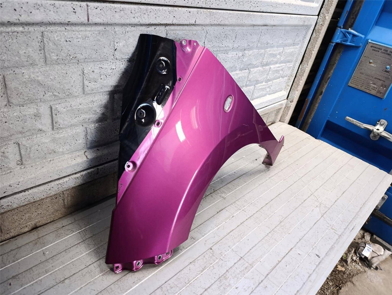 TOYOTA AYGO 2 2014-2022 BŁOTNIK LEWY PRZEDNI ORYGINAŁ (17814035203)