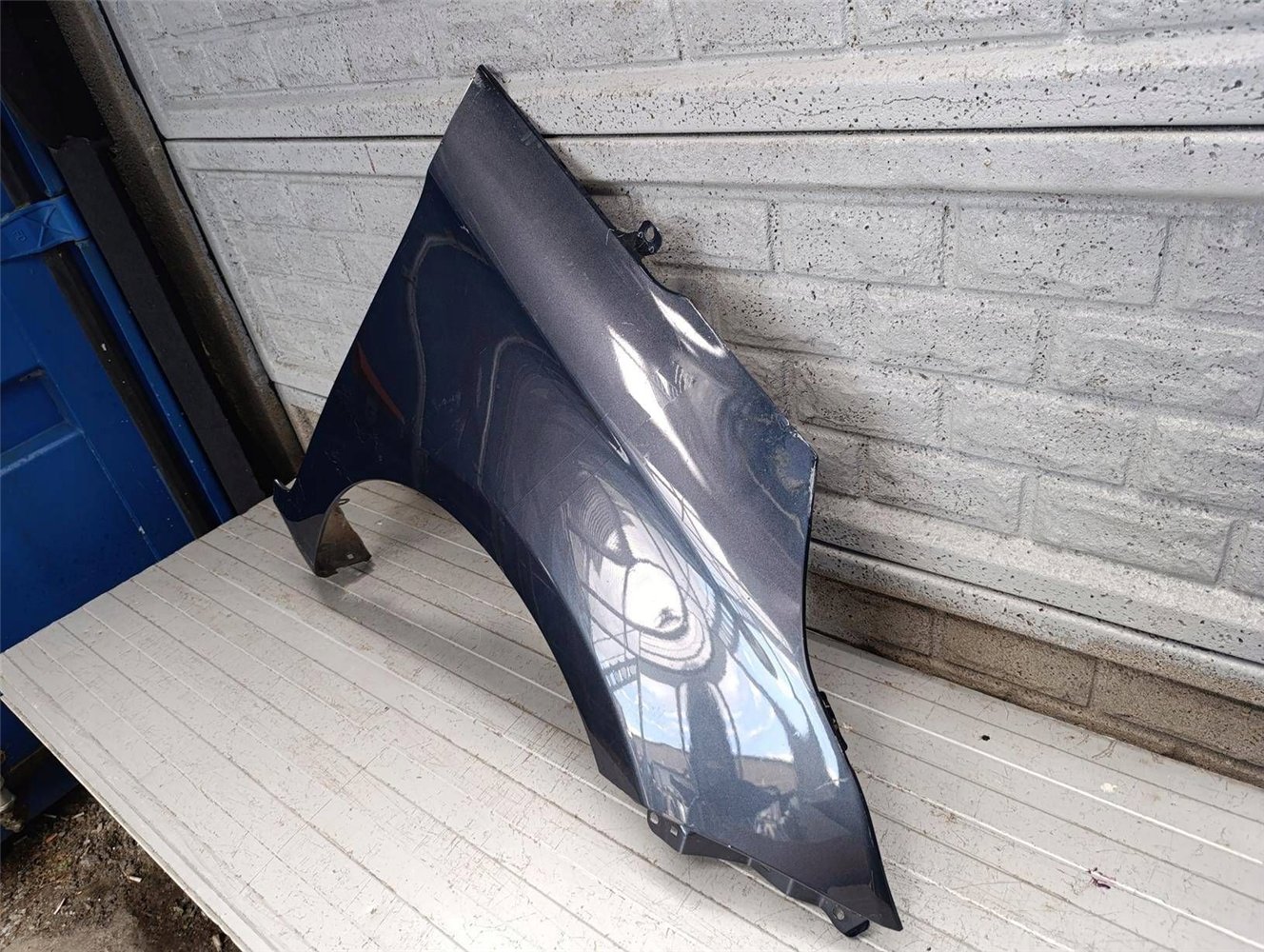 KIA CARENS BŁOTNIK PRAWY PRZEDNI ORYGINAŁ (17817111028)