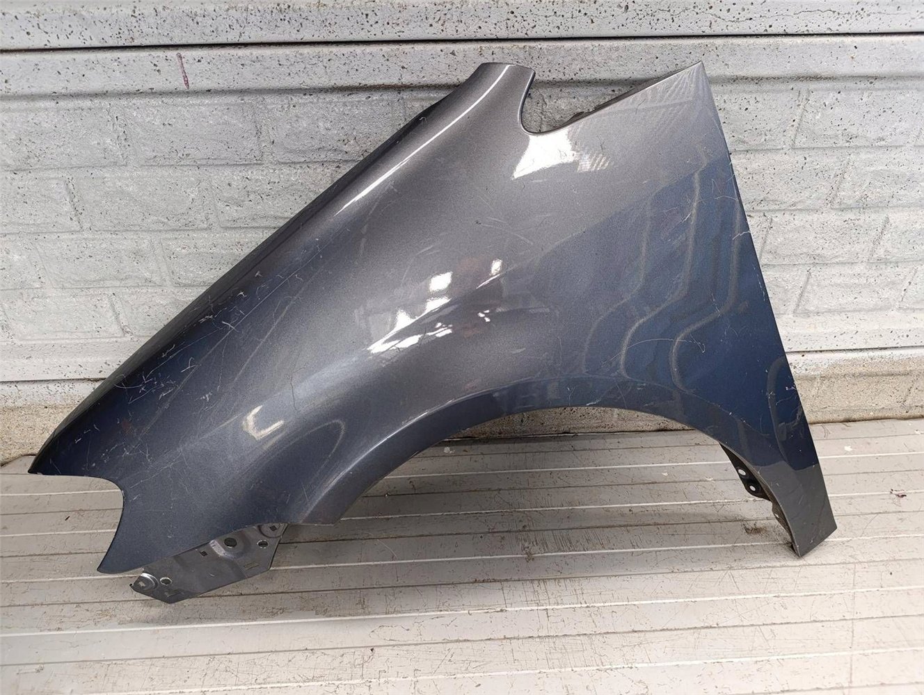 VW TOURAN LIFT BŁOTNIK LEWY 2007-2010 ORYGINAŁ (17817160056)