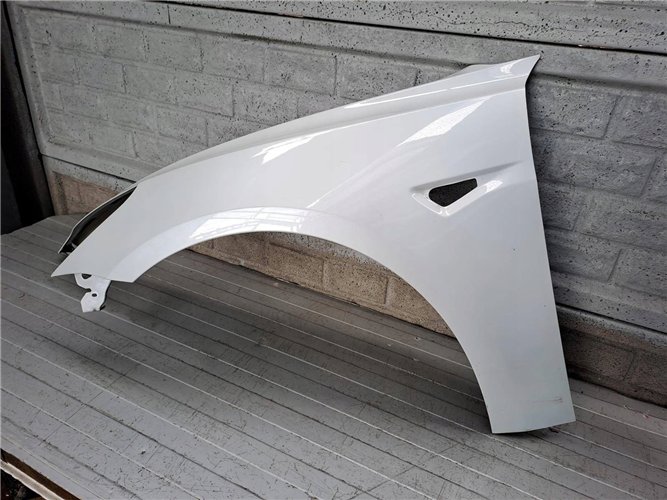 TESLA 3 III 2017-2022 BŁOTNIK PRZEDNI LEWY ORYGINAŁ (17819995346)