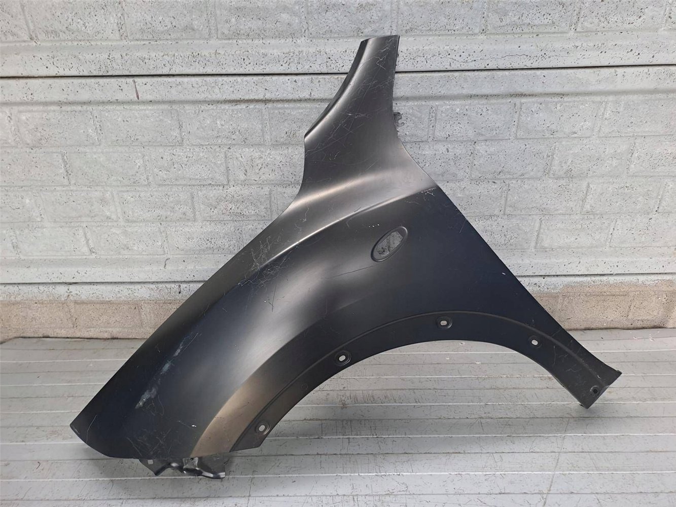 NISSAN JUKE 10-15 BŁOTNIK PRZEDNI LEWY NOWY ORYGINAŁ (17820015494)