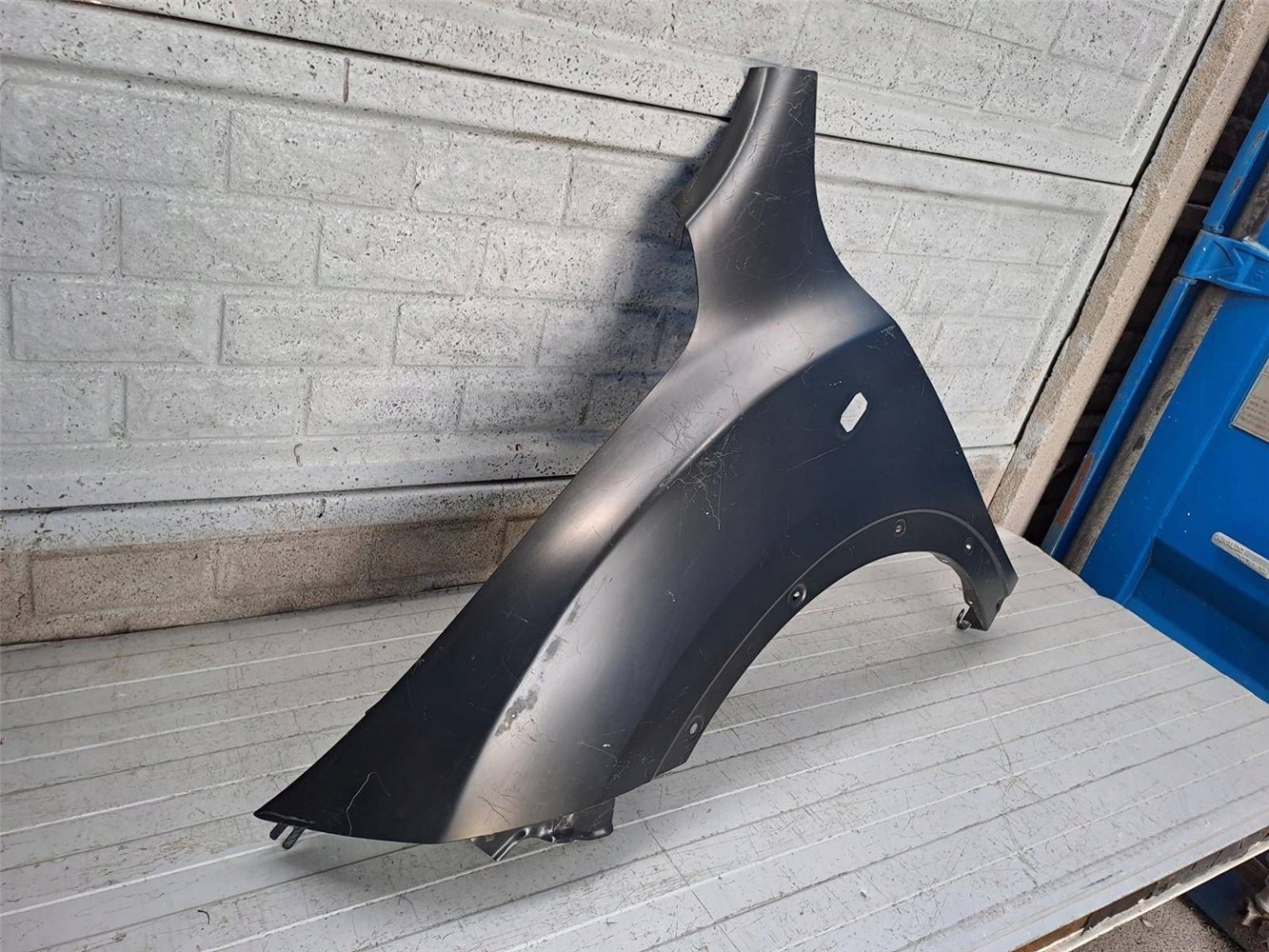 NISSAN JUKE 10-15 BŁOTNIK PRZEDNI LEWY NOWY ORYGINAŁ (17820015494)