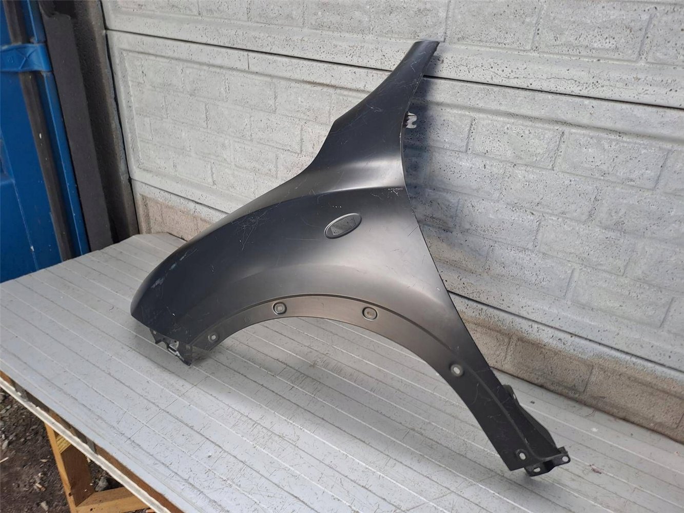 NISSAN JUKE 10-15 BŁOTNIK PRZEDNI LEWY NOWY ORYGINAŁ (17820015494)