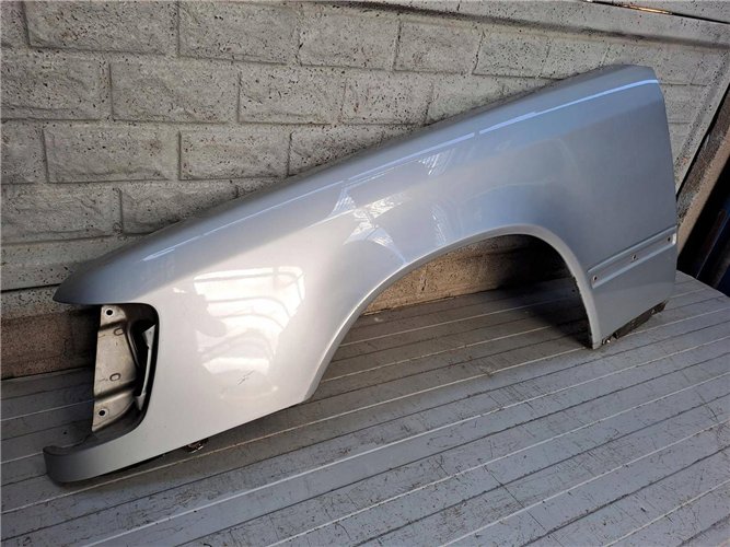 MERCEDES W124 BŁOTNIK LEWY ORYGINAŁ (17828080572)