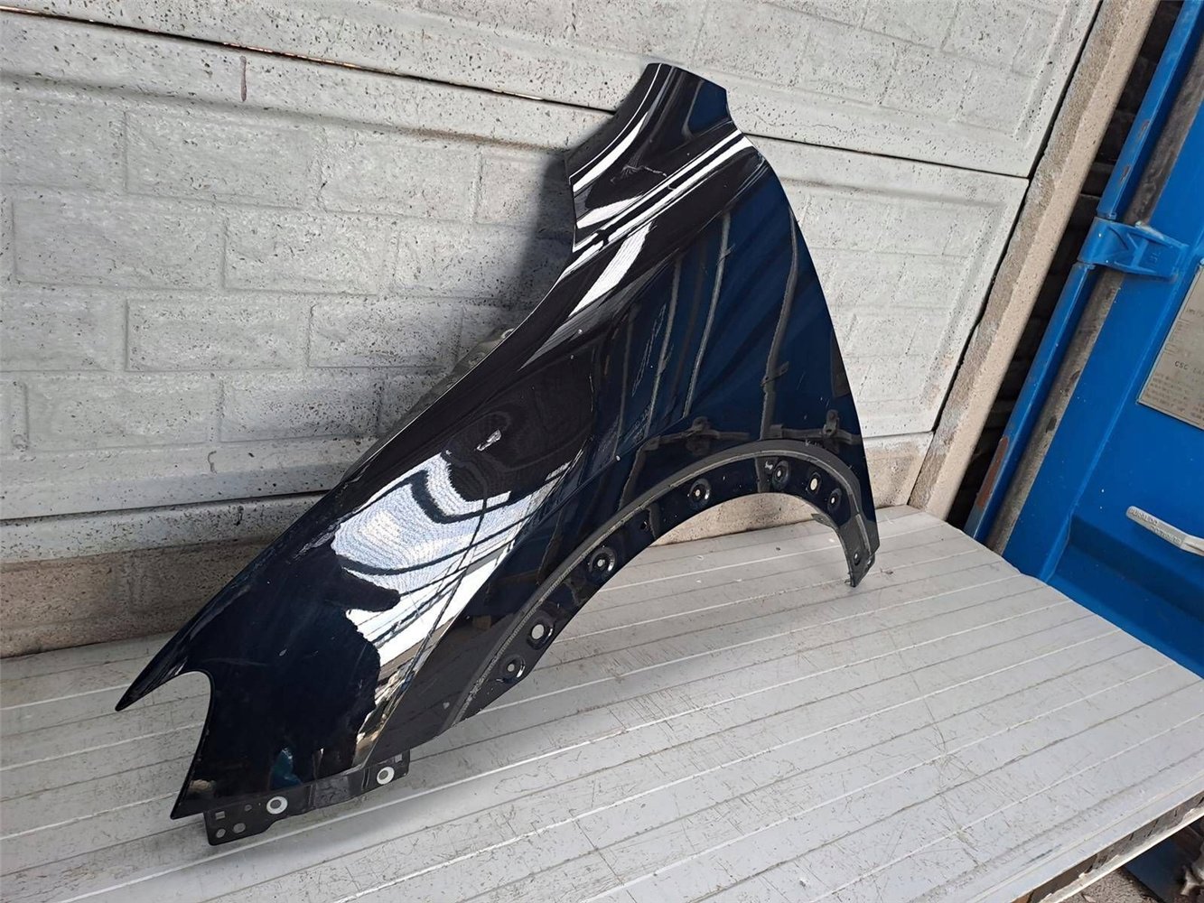 MG HS 18- BŁOTNIK PRZEDNI LEWY ORYGINAŁ (17828122053)