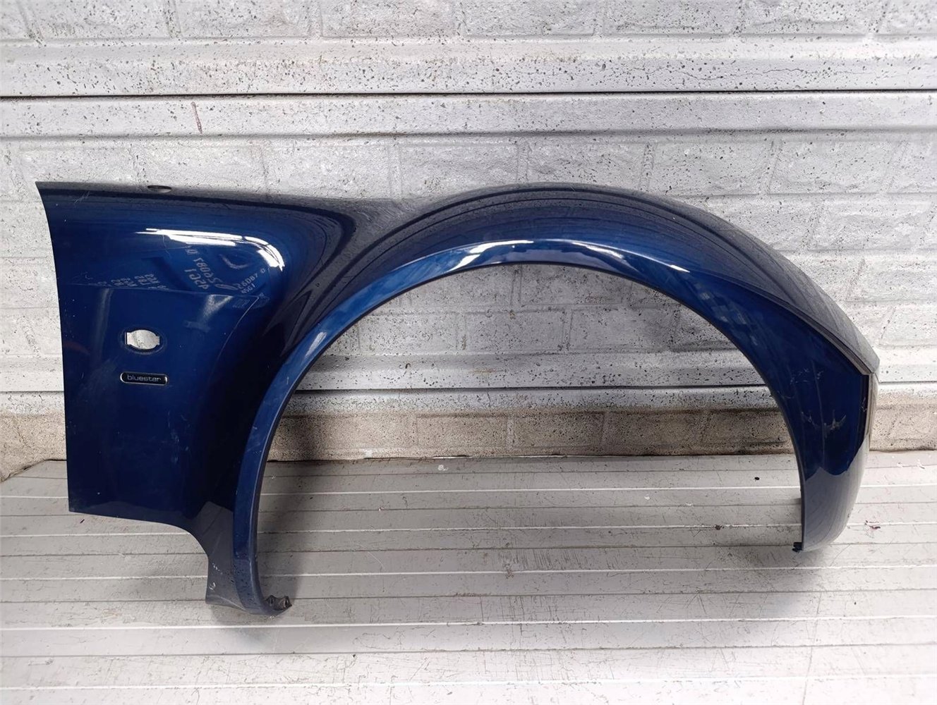 SMART ROADSTER 2002 – 2005 BŁOTNIK PRZEDNI PRAWY ORYGINAŁ (17828208260)