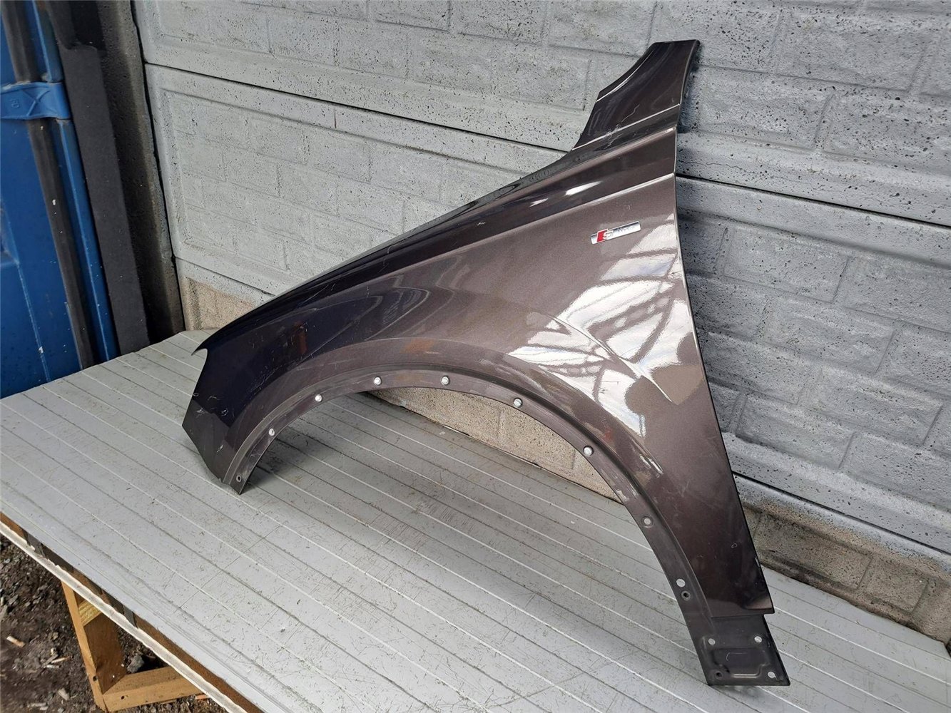 AUDI Q7 4M 2015-2024 BŁOTNIK LEWY PRZEDNI ORYGINAŁ (17831203075)