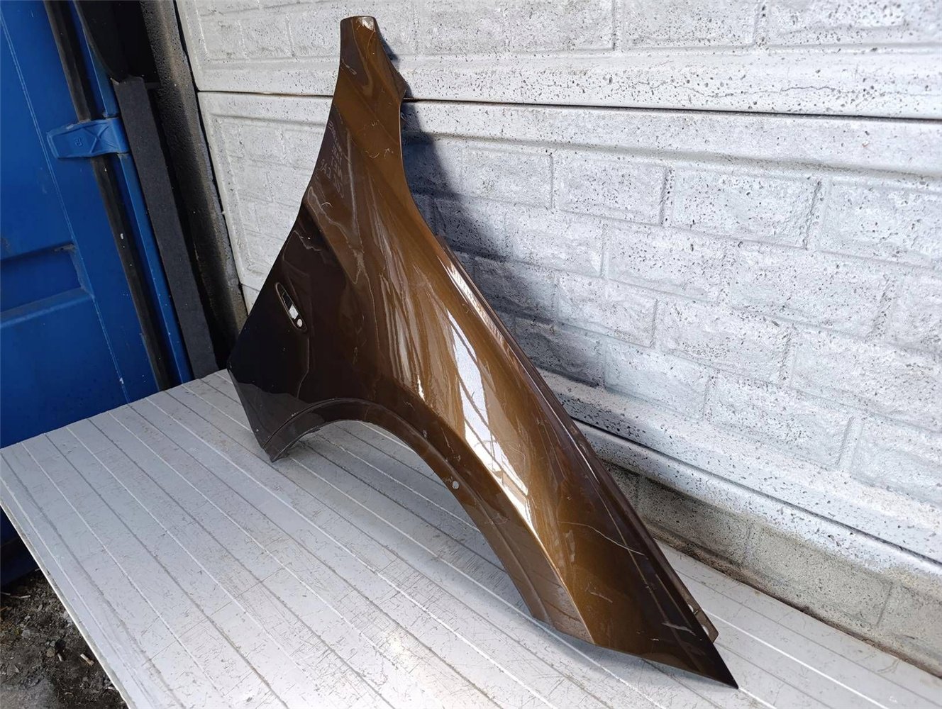 BMW X1 E84 2008-2013 BŁOTNIK PRAWY PRZEDNI ORYGINAŁ (17834030522)