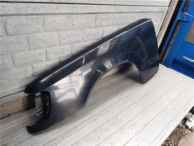 MERCEDES W124 BŁOTNIK LEWY ORYGINAŁ (17834085513)