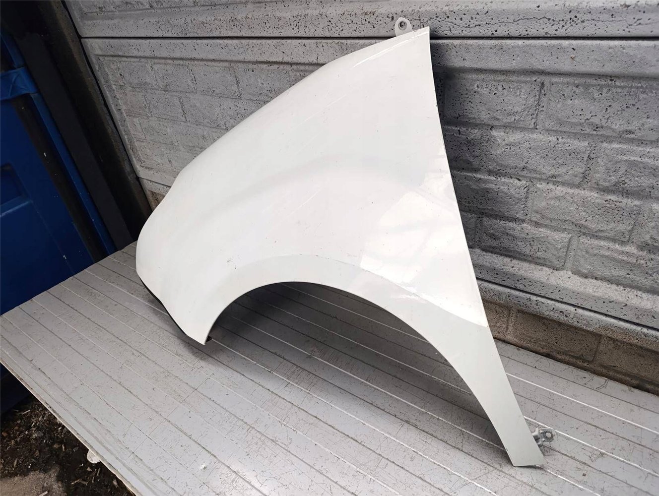 FIAT DOBLO COMBO 10-15 BŁOTNIK PRZEDNI LEWY ORYGINAŁ (17854736200)