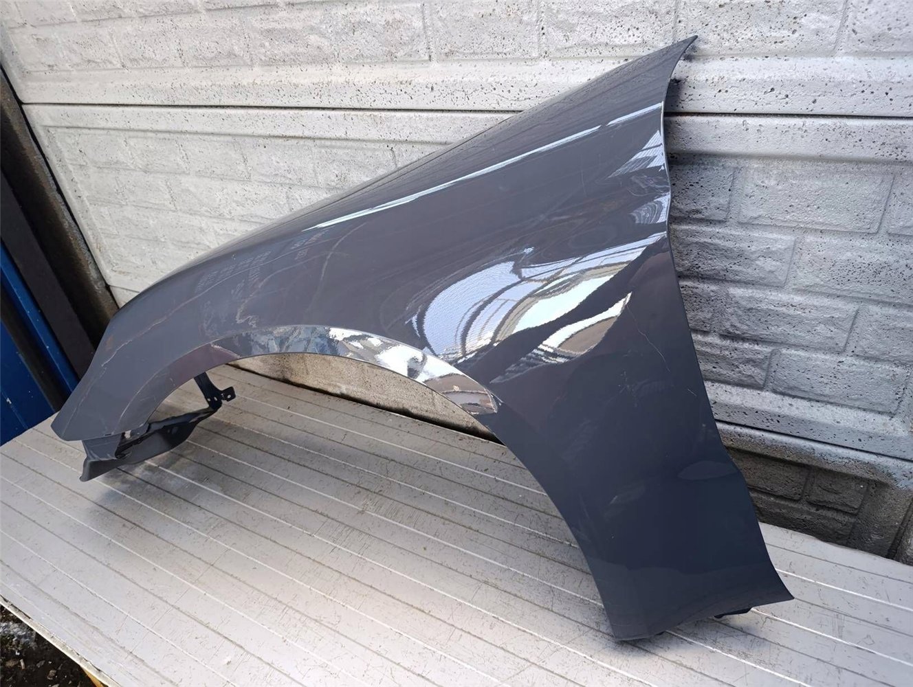 PORSCHE PANAMERA 976 BŁOTNIK PRZEDNI LEWY ORYGINAŁ (17861115727)