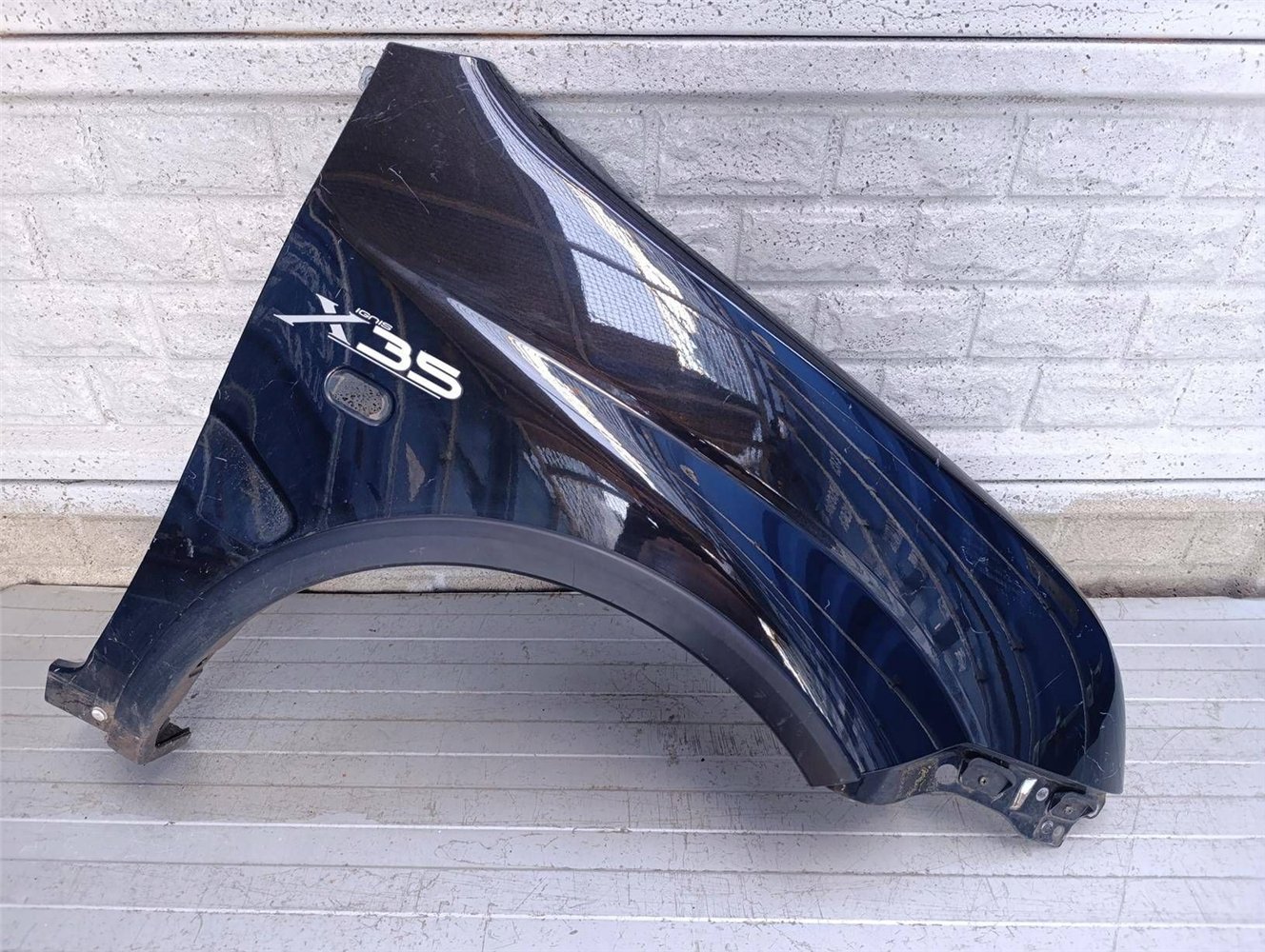 SUZUKI IGNIS II 2 2003-2010 BŁOTNIK PRZEDNI PRAWY ORYGINAŁ (17879741208)