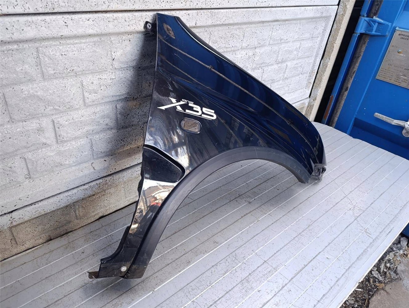 SUZUKI IGNIS II 2 2003-2010 BŁOTNIK PRZEDNI PRAWY ORYGINAŁ (17879741208)