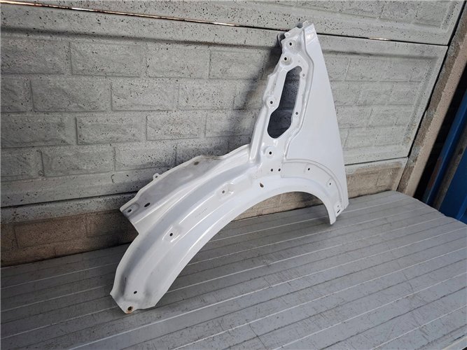 MINI COOPER COUNTRYMAN PACMAN R60 61 BŁOTNIK LEWY ORYGINAŁ (17883059032)