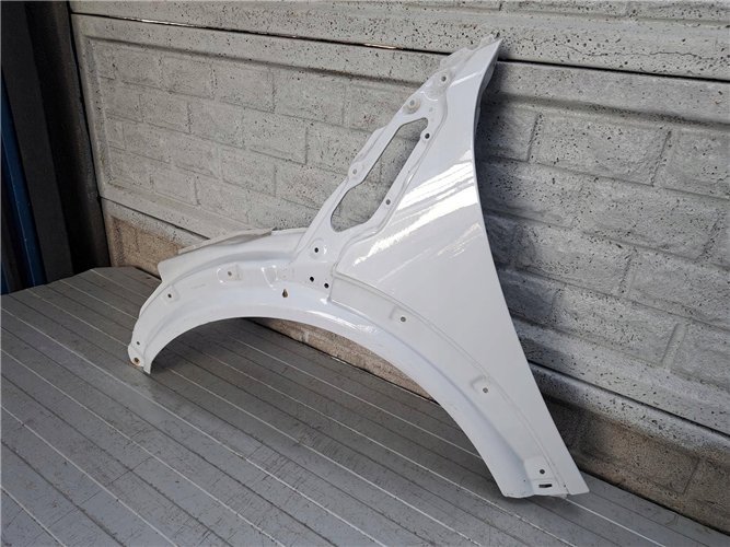 MINI COOPER COUNTRYMAN PACMAN R60 61 BŁOTNIK LEWY ORYGINAŁ (17883059032)