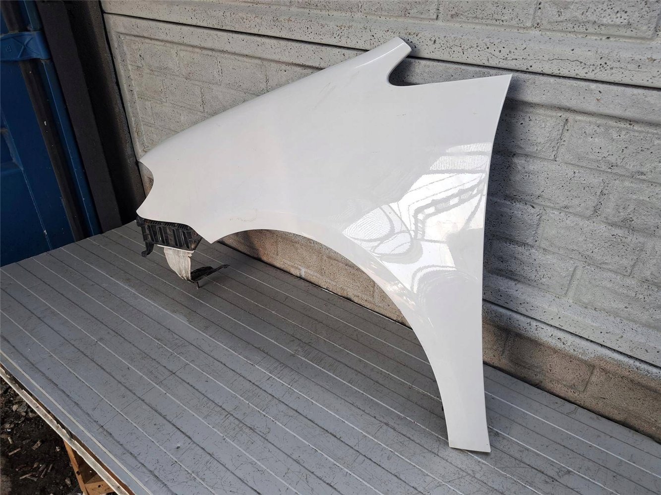 VW TOURAN LIFT BŁOTNIK LEWY 2007-2010 ORYGINAŁ (17883095473)