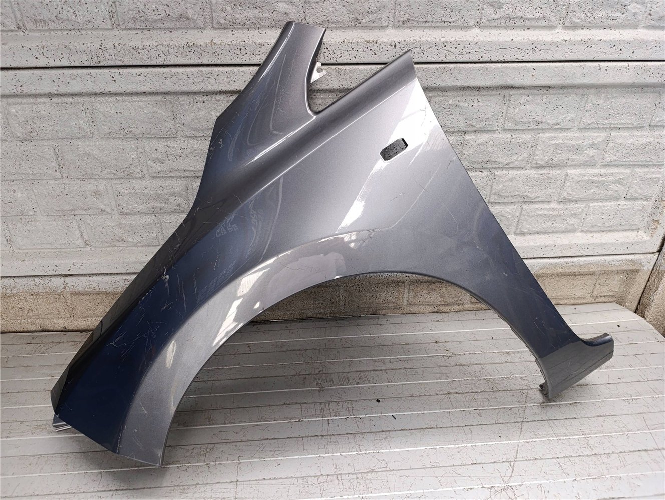 NISSAN LEAF BŁOTNIK PRZEDNI LEWY ORYGINAŁ (17891226742)