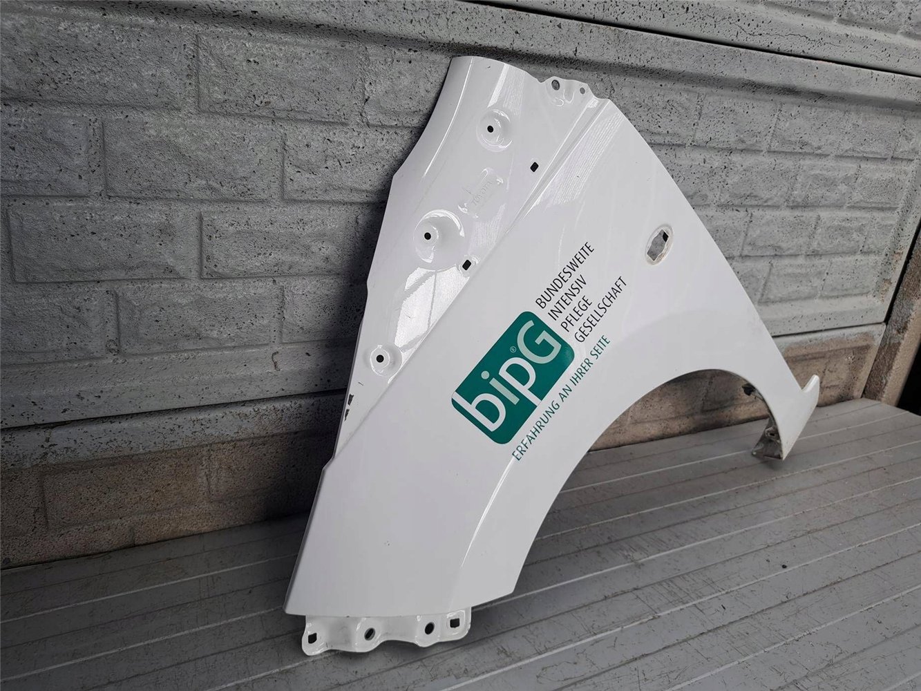 TOYOTA AYGO 2 2014-2022 BŁOTNIK LEWY PRZEDNI ORYGINAŁ (17893961650)