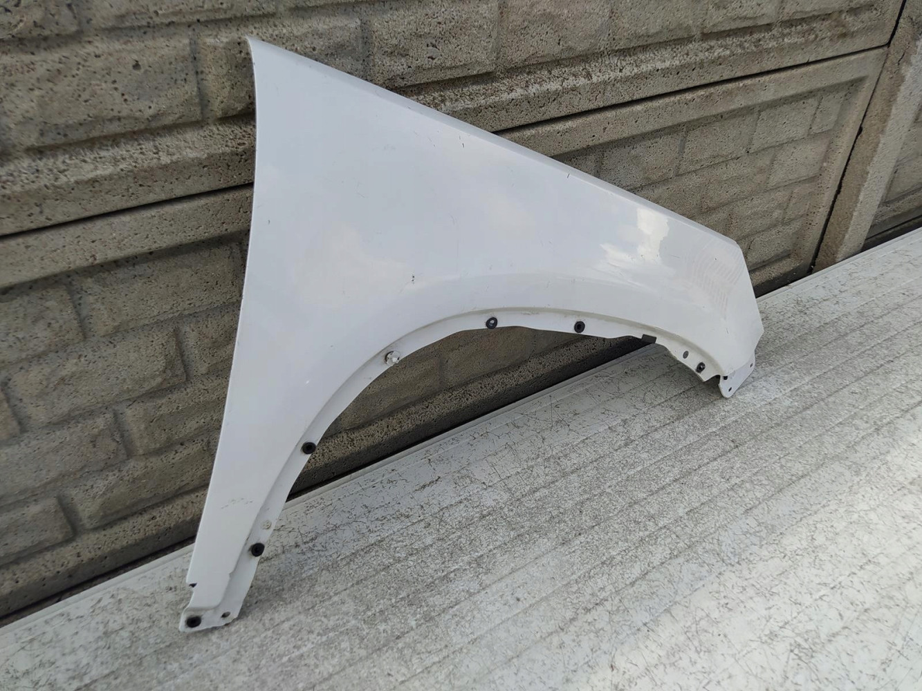 VW TIGUAN 2007-2017 BŁOTNIK PRZEDNI PRAWY - (12364203251)