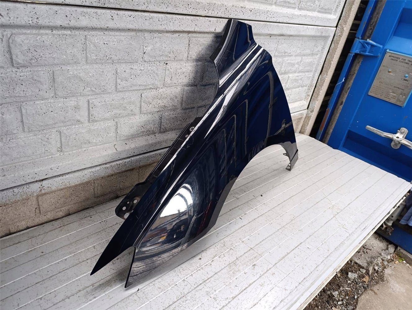 BŁOTNIK LEWY PRZÓD MG 5 EV 2020- ORYGINAŁ (17897234168)