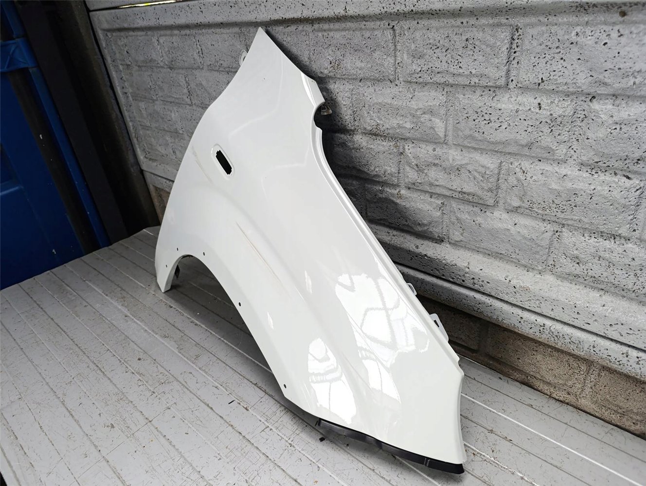 FIAT PANDA 3 CROSS 13-18 BŁOTNIK PRZEDNI PRAWY ORYGINAŁ (17897311453)