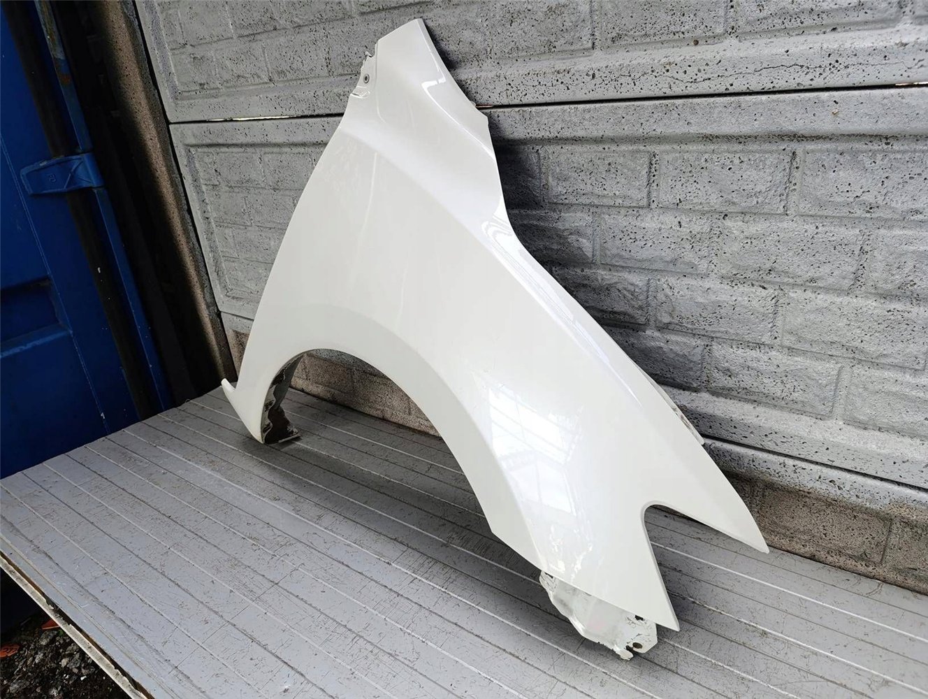 BŁOTNIK PRAWY PRZEDNI NISSAN PULSAR ORYGINAŁ (17900662509)