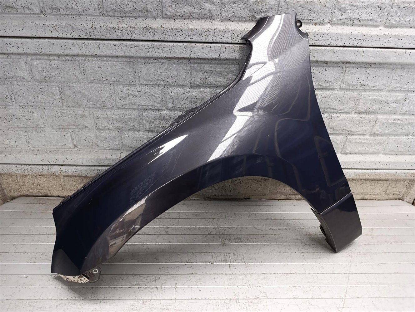 SUZUKI GRAND VITARA LIFT 05-14 BŁOTNIK LEWY PRZÓD ORYGINAŁ (17904974859)