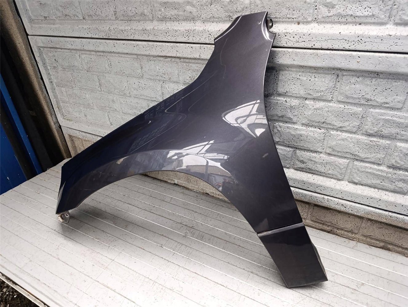 SUZUKI GRAND VITARA LIFT 05-14 BŁOTNIK LEWY PRZÓD ORYGINAŁ (17904974859)