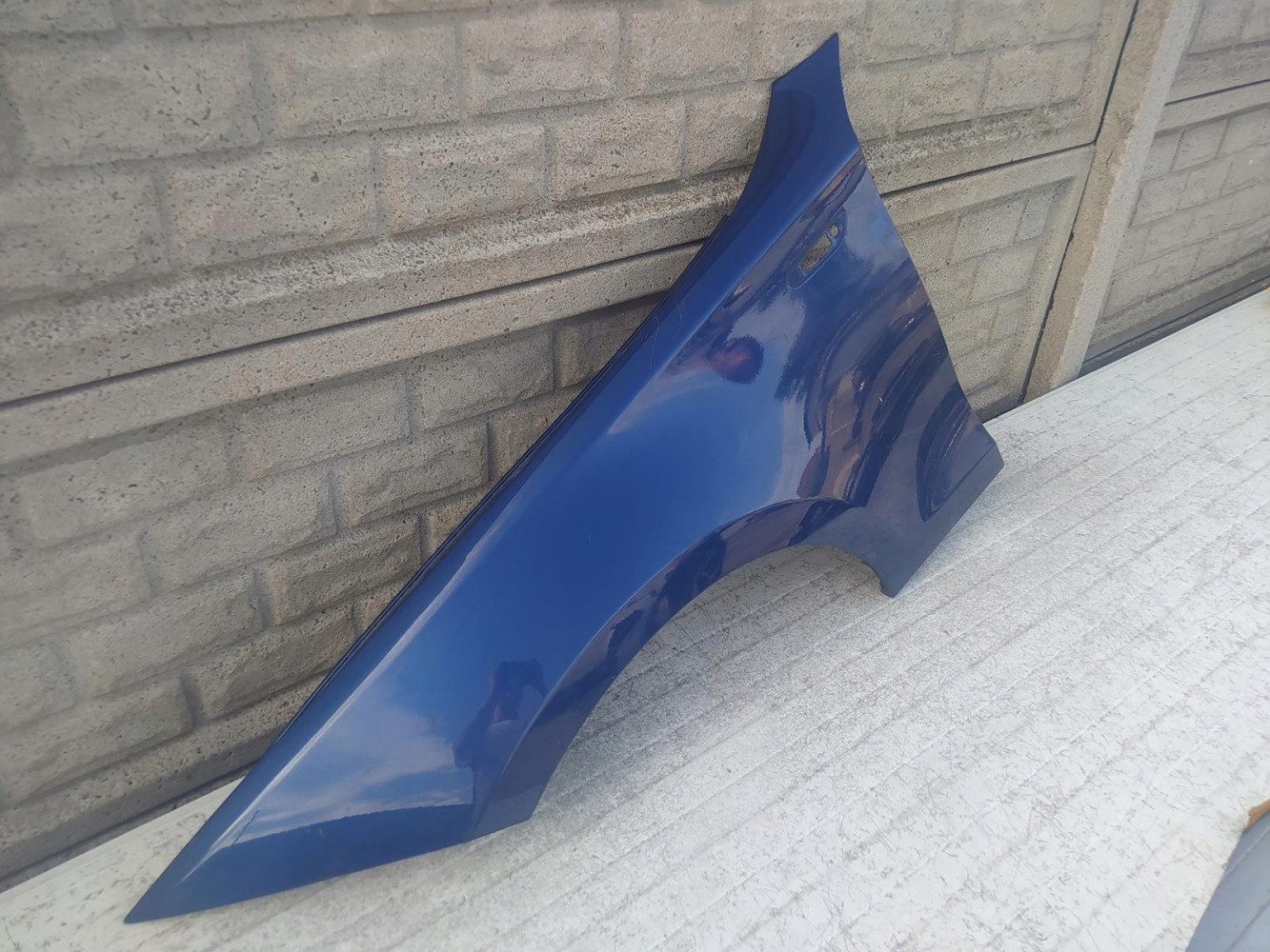 BMW 1 E87 E88 E81 E82 2004 - 2011 BŁOTNIK LEWY - (12403812391)
