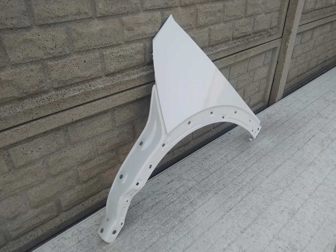 HYUNDAI IONIQ V 2021-2022- BŁOTNIK LEWY PRZEDNI - (12421419895)