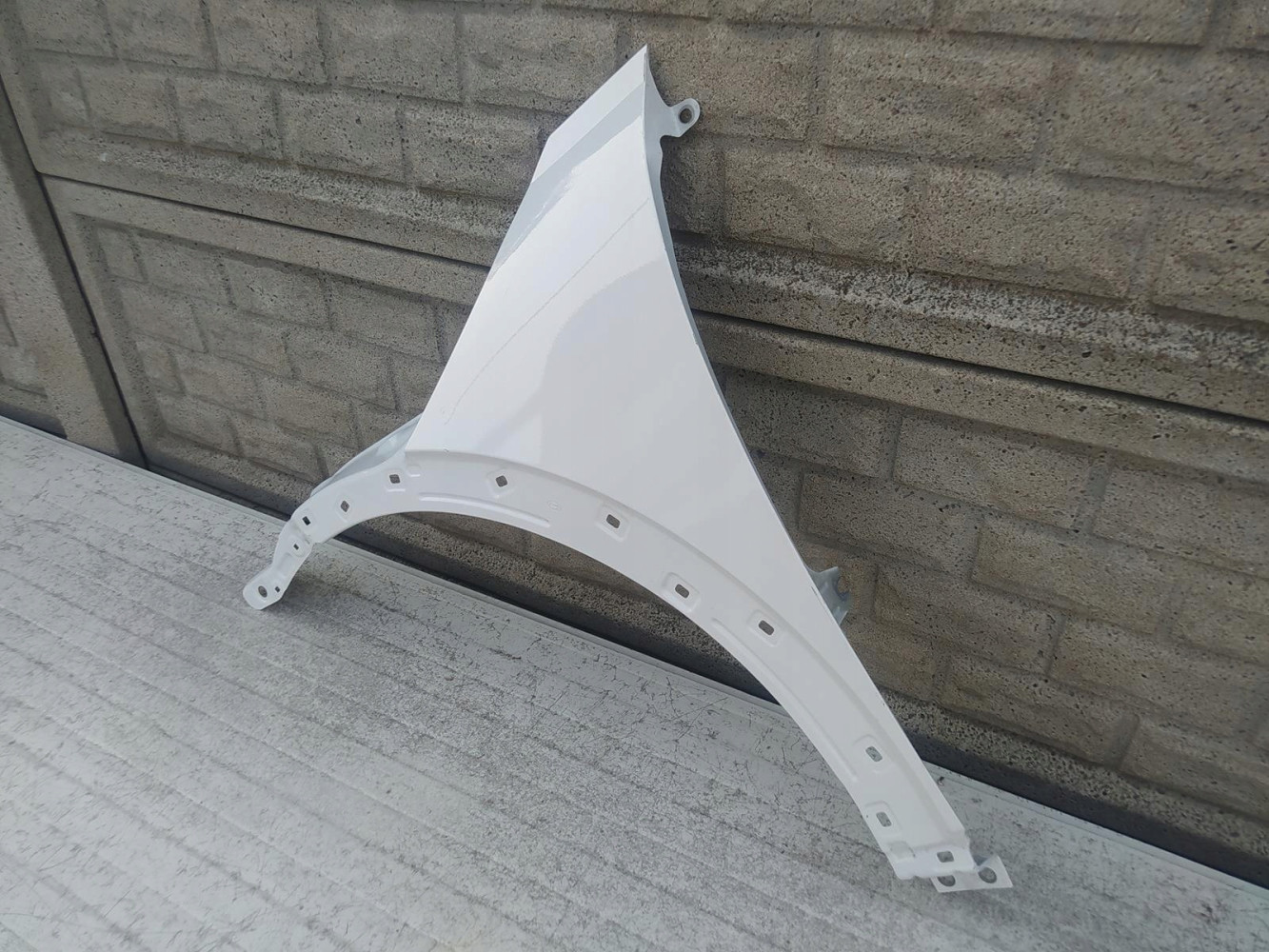 HYUNDAI IONIQ V 2021-2022- BŁOTNIK LEWY PRZEDNI - (12421419895)