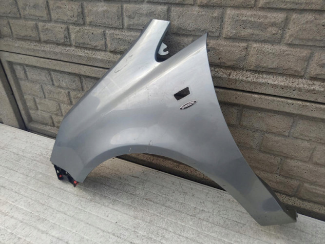 BŁOTNIK LEWY OPEL CORSA D 2006-2015 - (12516524289)
