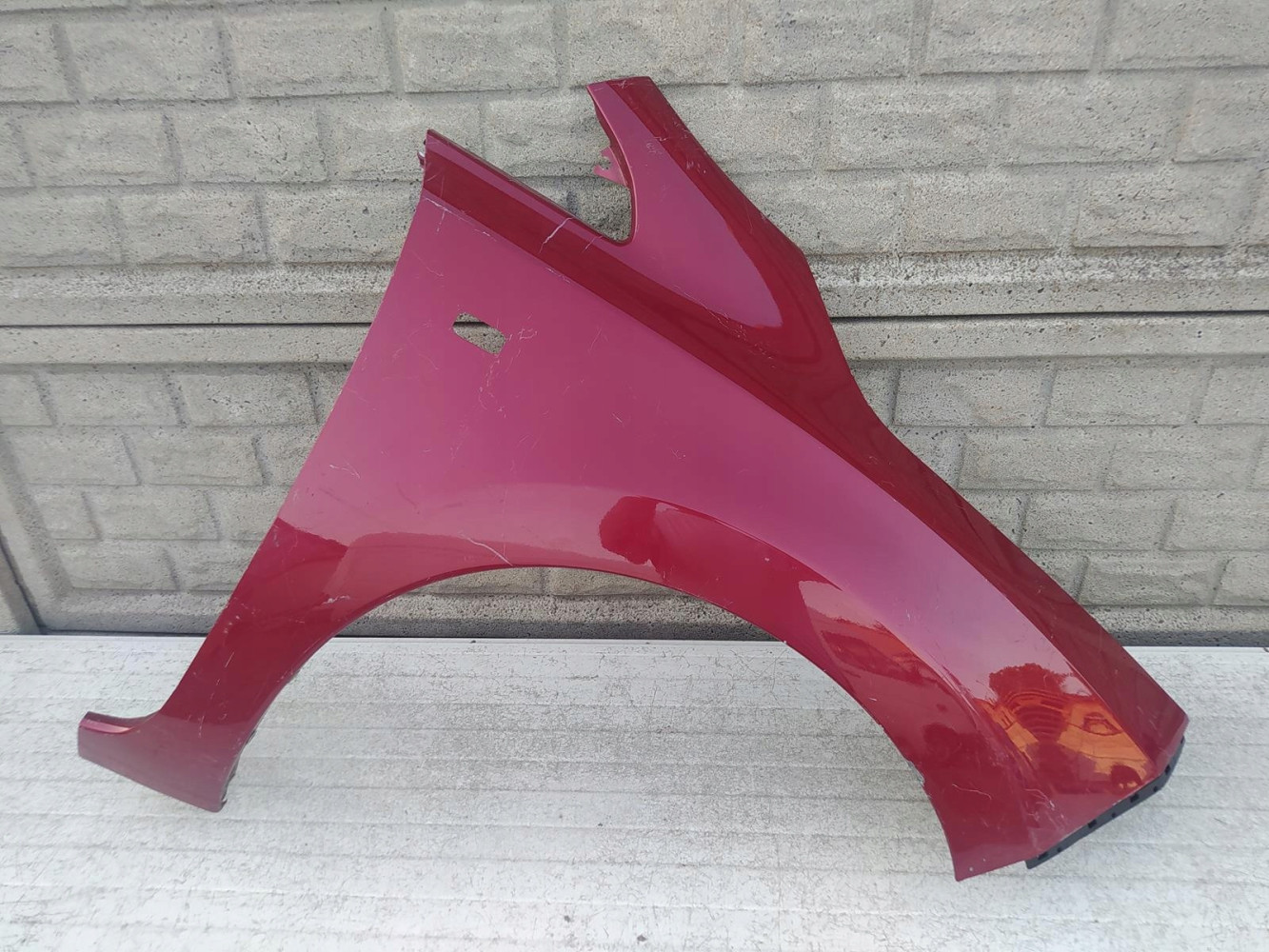 NISSAN LEAF BŁOTNIK PRZEDNI PRAWY - (12516835282)