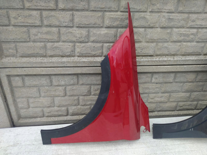 SEAT ARONA BŁOTNIK PRZEDNI LEWY - (12566813612)
